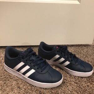 Blue Adidas tennis shoes